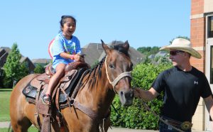 Camp Boro Student Riding Horse
