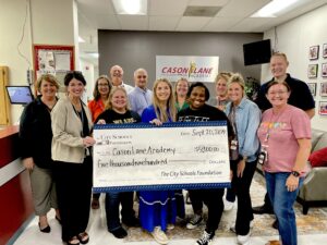 Foundation presents check to Cason Lane